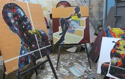 You are currently viewing Ivory Coast painter gives new life to e-waste
