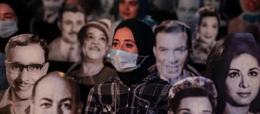 Read more about the article Cairo theatre employs famous faces to aid with social distancing – in pictures