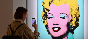 Read more about the article Andy Warhol’s Marilyn Monroe portrait sells for record $195m